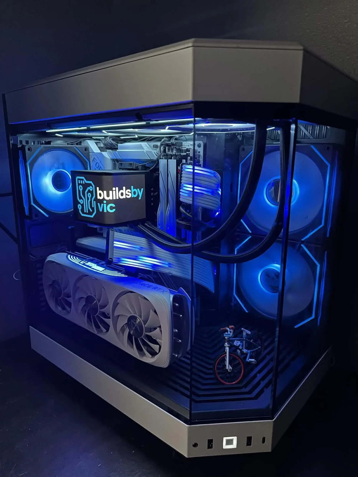 Custom BuildsByVic gaming PC with blue RGB lighting