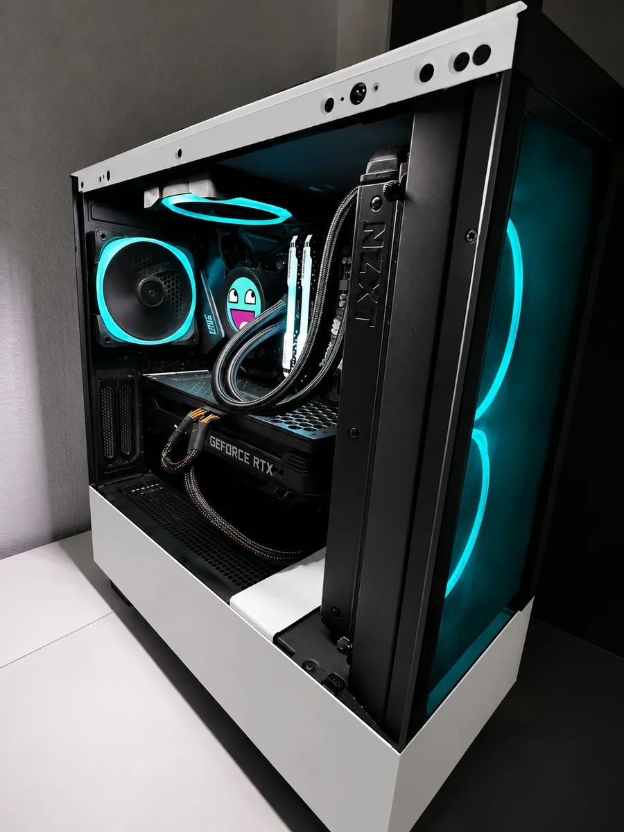 White and black build with teal accent lighting, nicknamed Tidal